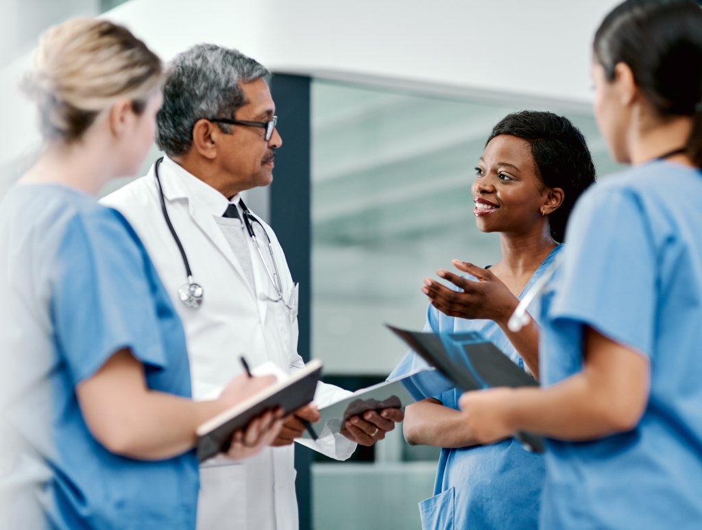 Shot of a group of medical practitioners having a discussion in a hospital